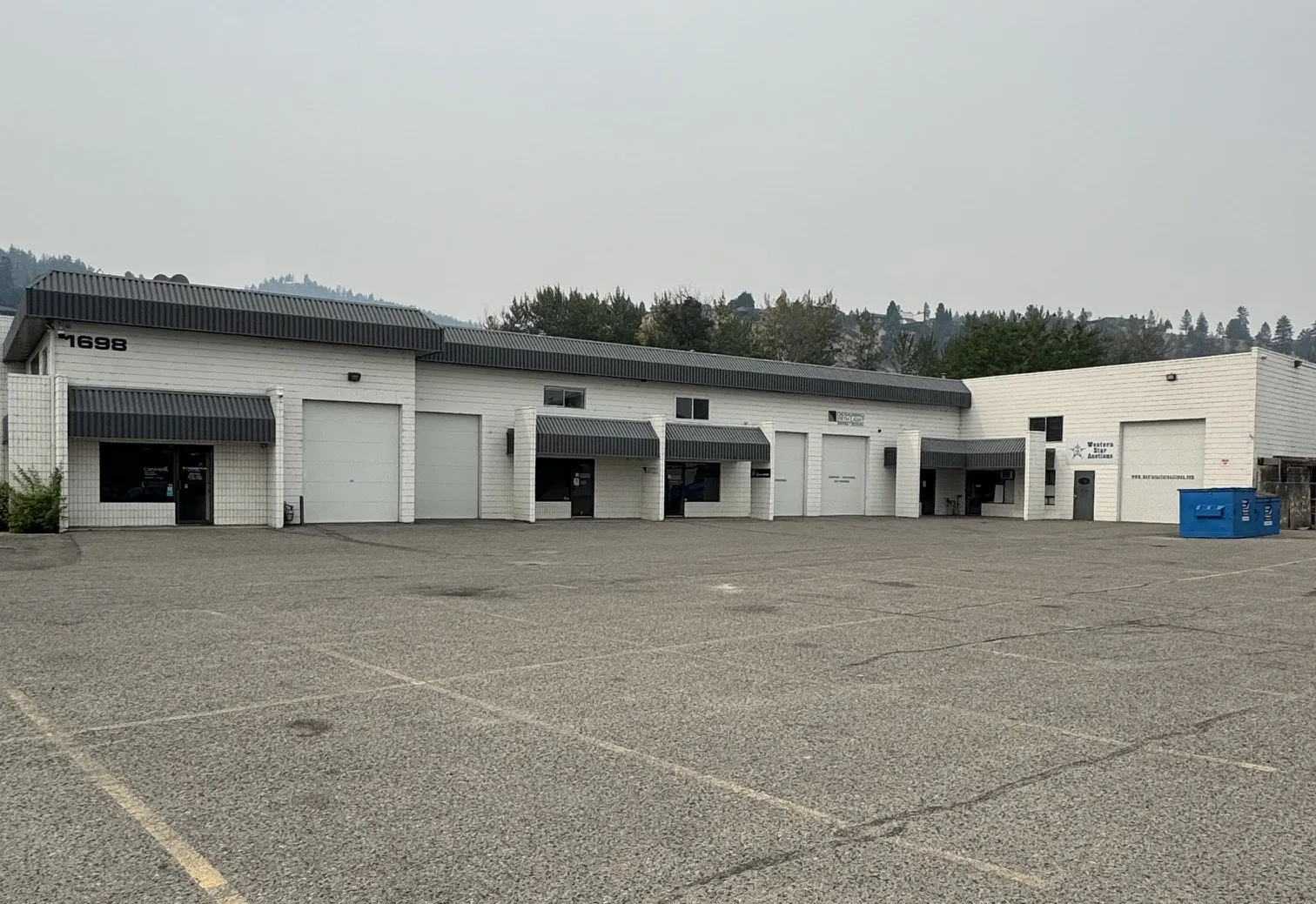 Grade-level overhead doors at 1698 Cary Road, Kelowna