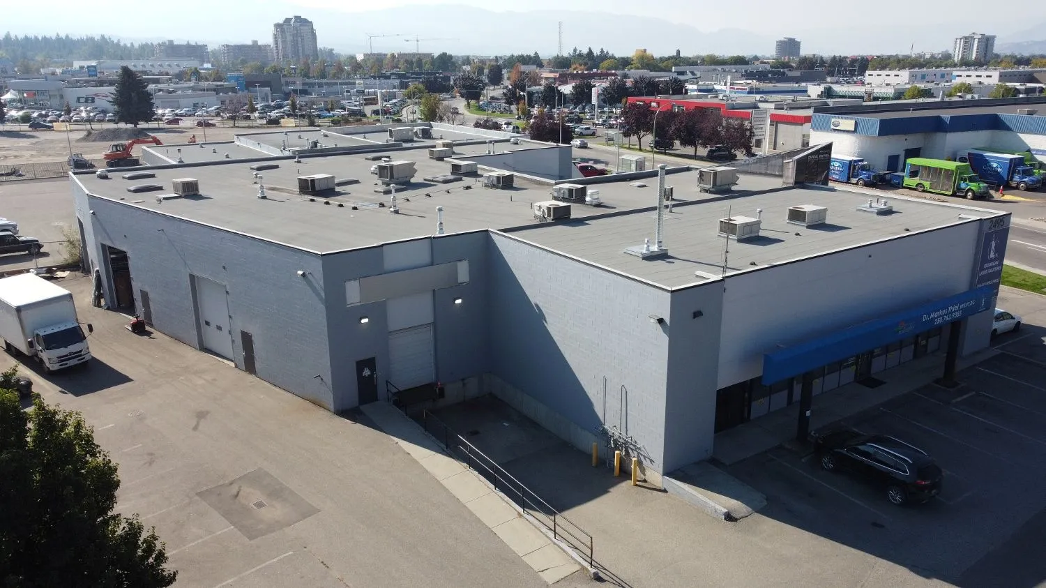 Rear warehouse elevation and loading door at 2495 Enterprise Way, Kelowna
